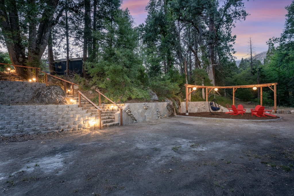 Stairs leading to sitting area next to Lewis Creek
