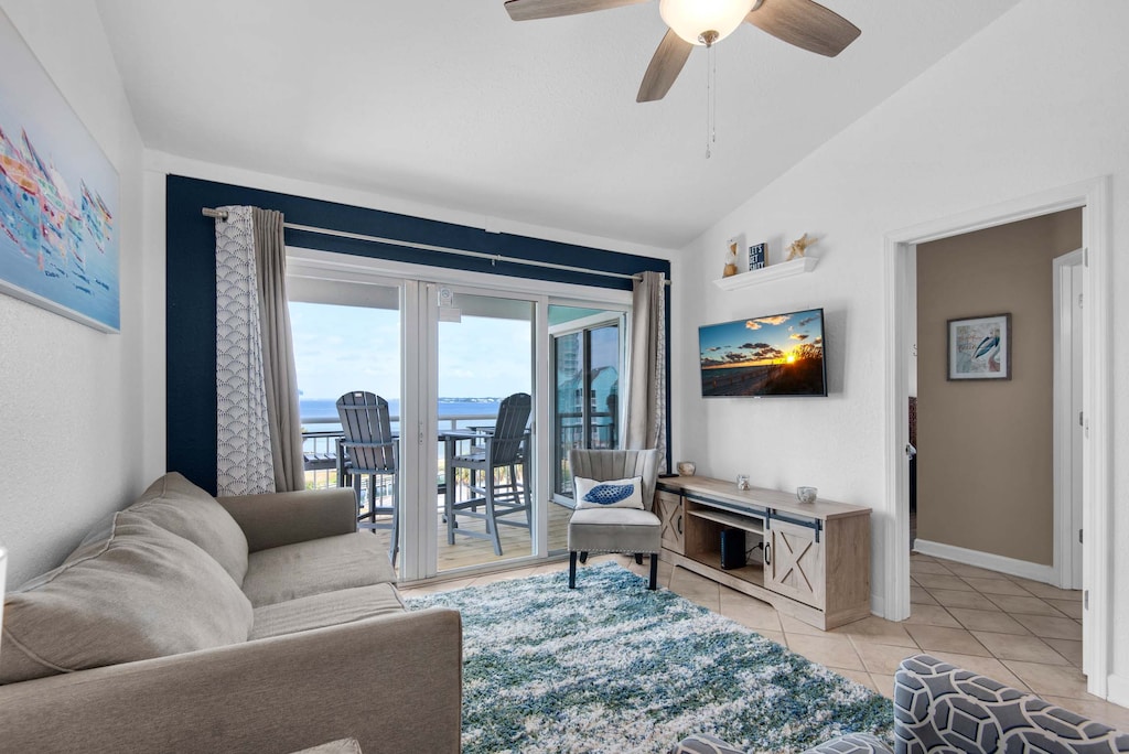 Living room with flat-screen TV and balcony access