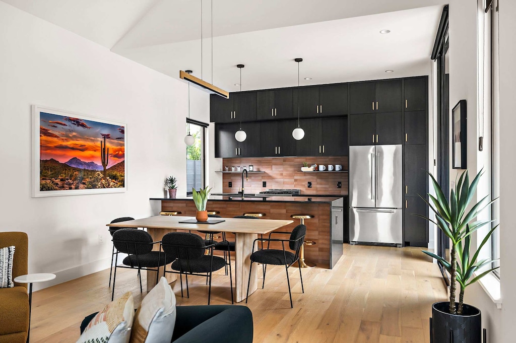 Gather and savor meals in the inviting dining area, designed for comfort and connection.