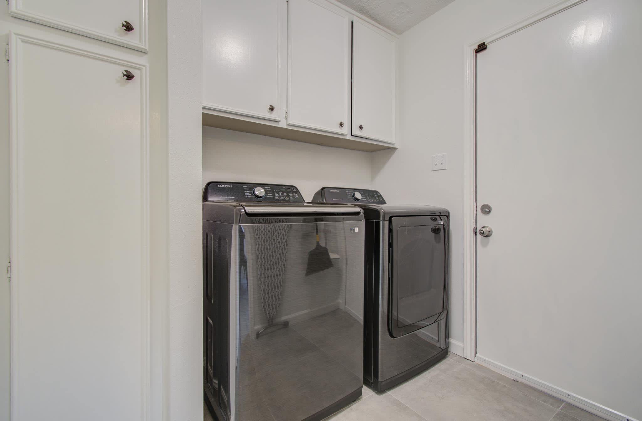The laundry room is fully equipped with a washer and dryer available for your use should you need to refresh your clothing during your stay. 