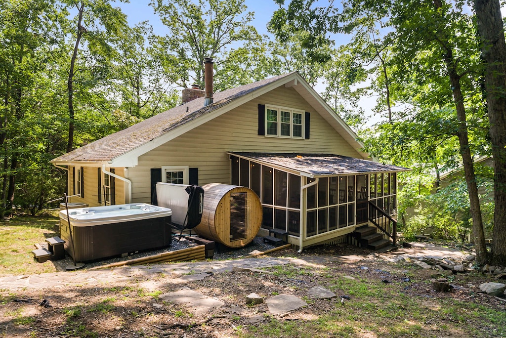 Unwind in the hot tub or relax in the private sauna, both offering serene views—your perfect retreat after a day of adventure. 