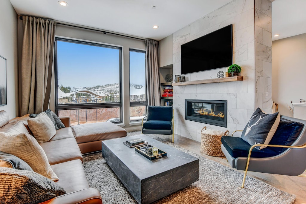 Living Area with HD TV and Gas Fireplace