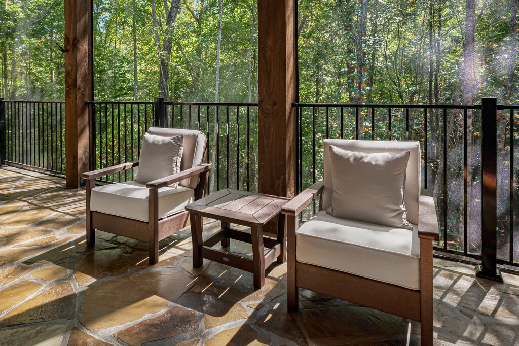 Iron Tree Lodge - Lower Level Screened In Deck Features Ample Seating, Cornhole Boards, and Hottub