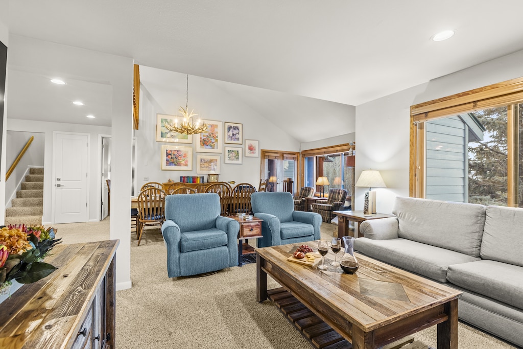 Snowflower 41 offers a spacious living area with two club chairs and sectional sofa.