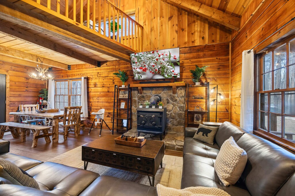 The high vaulted ceiling and open floor concept make this area feel even more expansive and full of natural light.