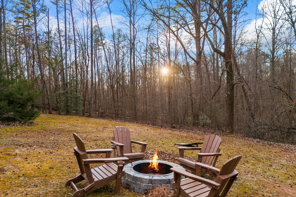 Relax by the firepit, where the crackling flames create the perfect ambiance for outdoor fun.