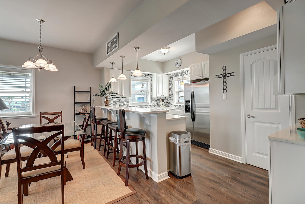 Dinning Area. Additional seating at the kitchen bar