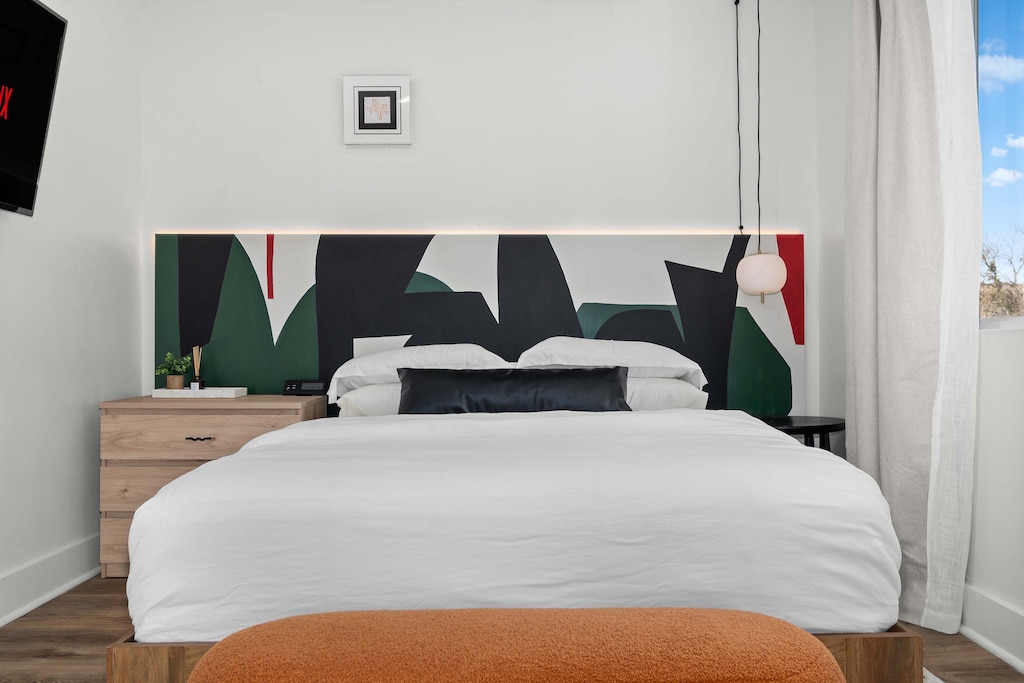 Furnished with fluffy pillows, crisp linens, and all the comforts of home, there will be nothing but sweet dreams from the luxuries of this delightful bedroom.