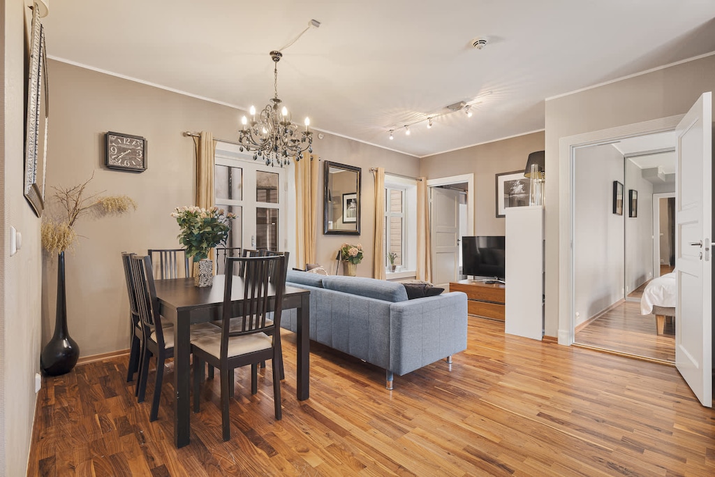 Open-concept living space with a dining area and a comfortable seating area.