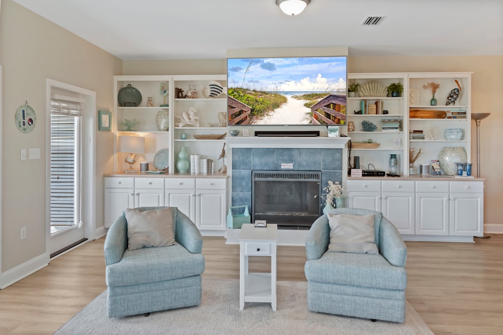 Watch a movie or sports on the large flat screen TV