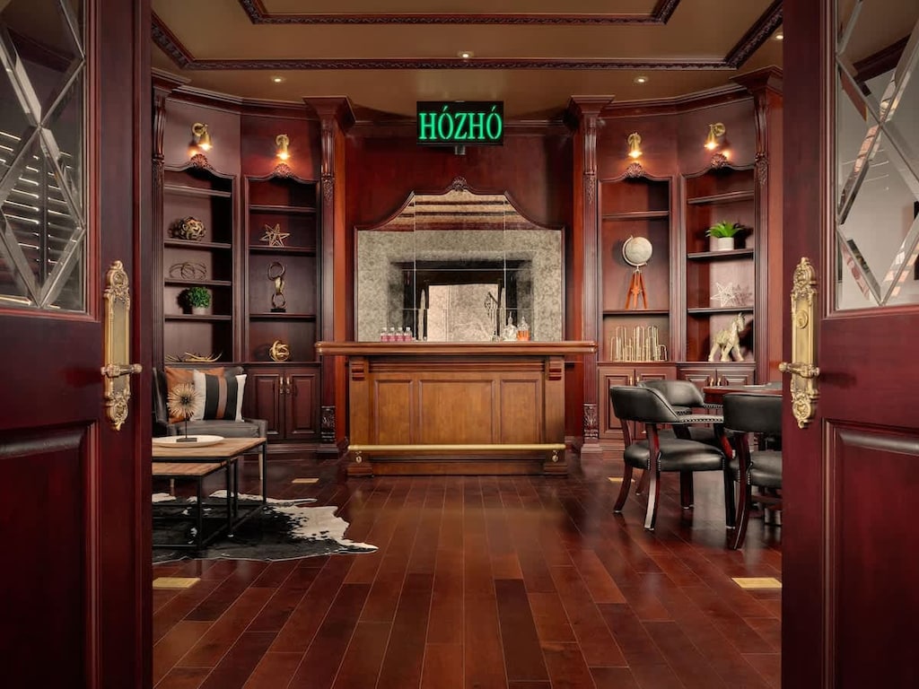 Elegant game room with custom poker table for sophisticated entertainment