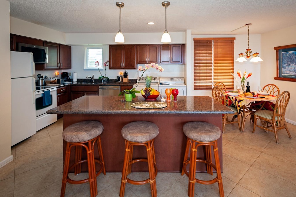 There's also seating at the island for quick breakfasts, afternoon snacks, or just keeping the cook company!