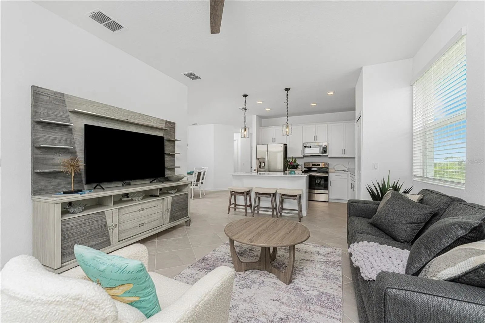 Living room with comfy seating and 55-inch Smart TV Living room with comfy seating and 55-inch Smart TV