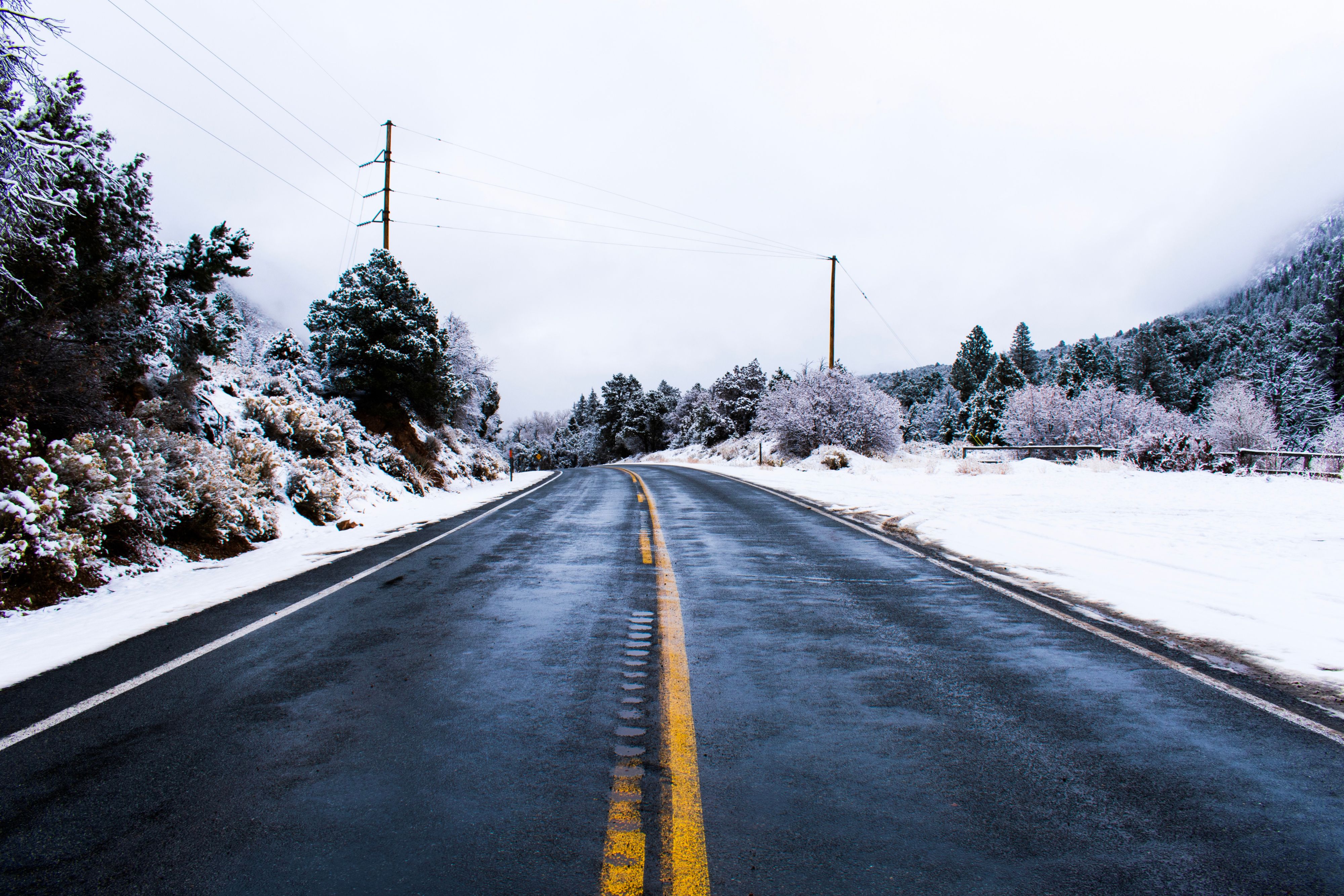 Your winter wonderland adventure begins with this magical snow-covered road leading to your cozy retreat. Feel the crisp mountain air and pristine beauty surrounding you.