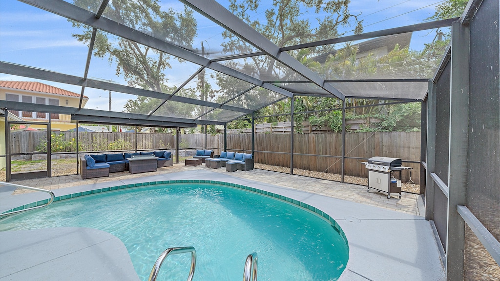 The spacious, screened lanai is perfect for all-day outdoor fun, featuring your sparkling private pool, a gas BBQ grill for cookouts, and an expansive lounge area for relaxing.