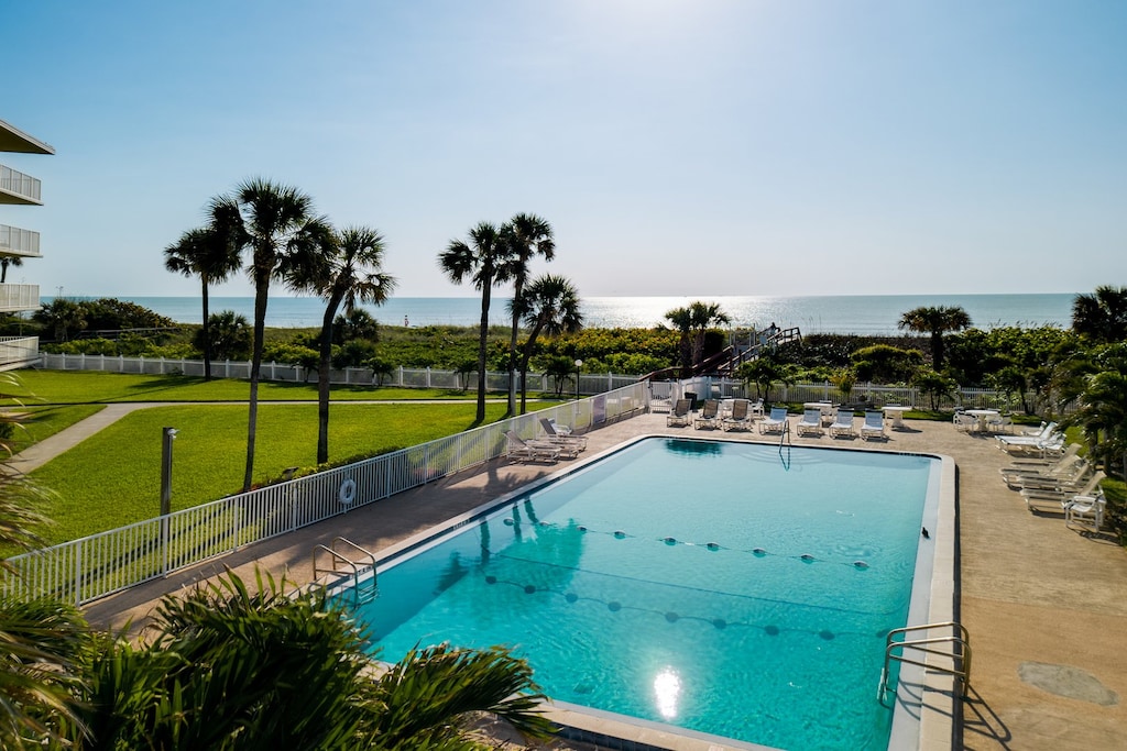 Enjoy the large heated pool overlooking the ocean.