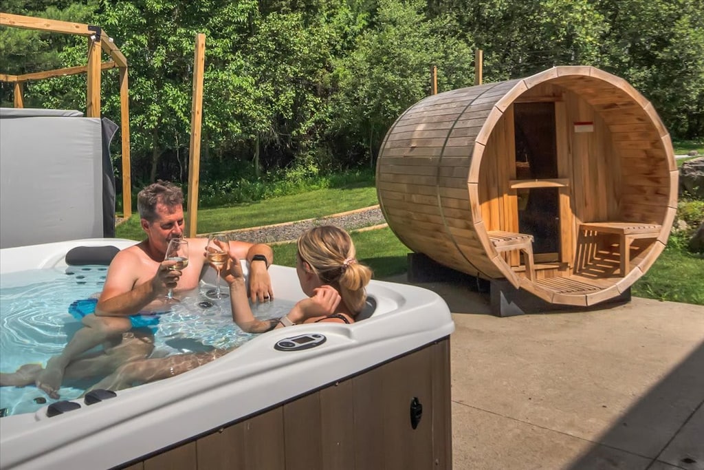 Create your own spa-like experience at Wooded Retreat in the Poconos in the comfort and privacy of a hot tub and barrel sauna.