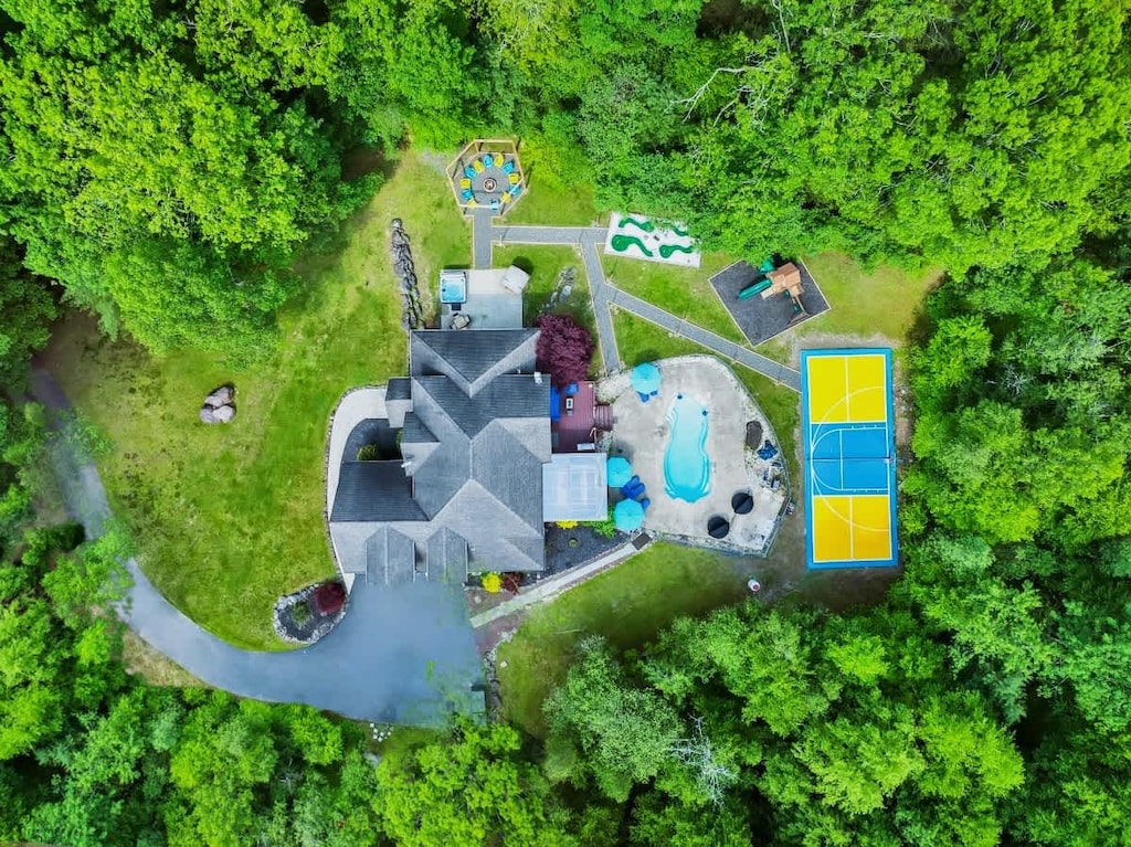 Wooded Retreat is more than just a place to stay – it’s a destination. Experience the majesty of the Poconos Mountains in this beautiful home packed with top-tier amenities inside & out surrounded by tall trees on a 5-acre very private lot.