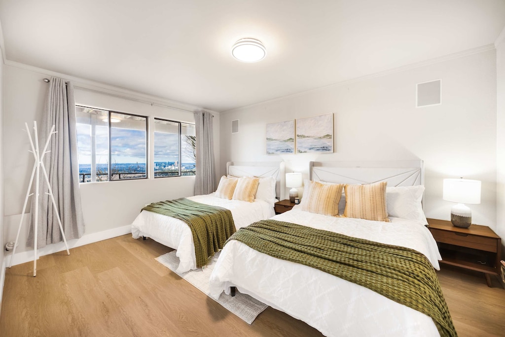 Here are two full size beds in the bedroom with amazing view!