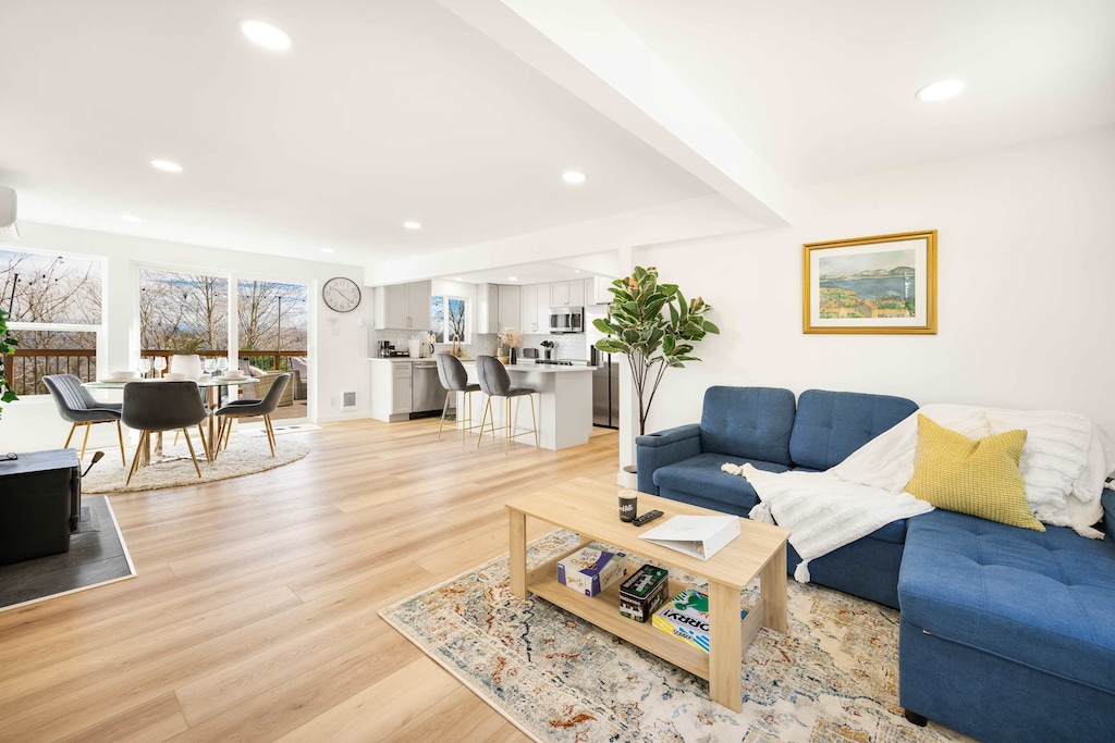 Here is the spacious living room with the brand new kitchen