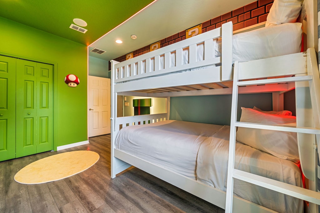 Bedroom 5 Mario Bros theme room with 2 double beds