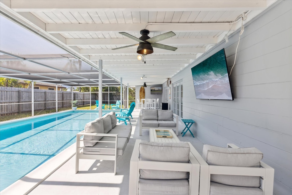 Lounge by the pool in this breezy, stylish retreat.