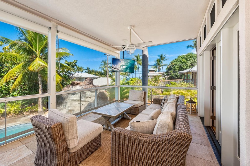 Lanai off the main floor with television