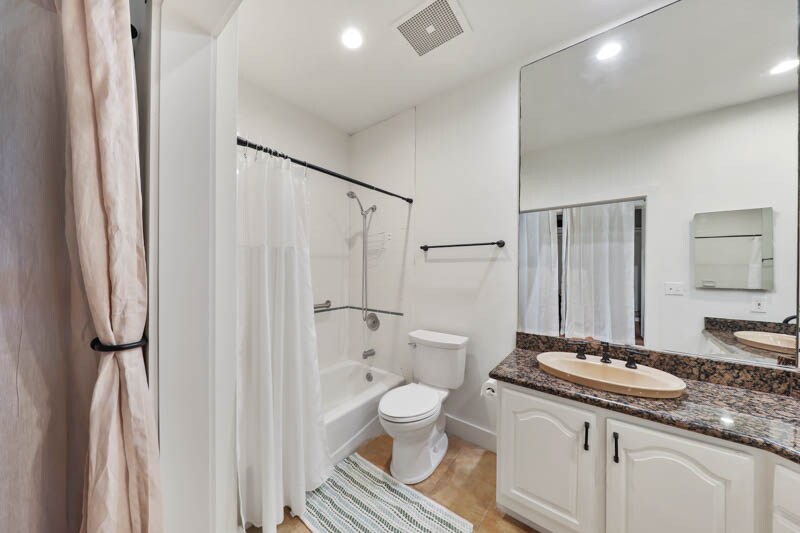Primary bathroom with tub/shower combo