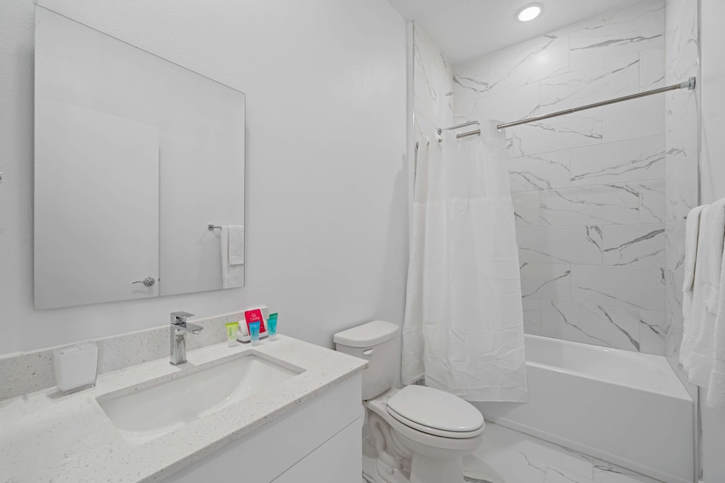 Step into this bright, spa-like bathroom designed to refresh and recharge - Relax in the elegant tub or prepare for the day in a space equipped with all the essentials - Thoughtful touches and sleek finishes ensure every moment here feels stylish