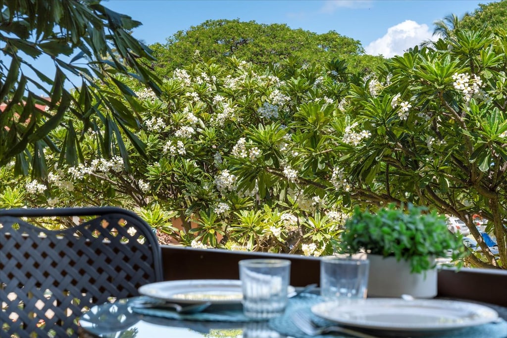 Fragrant Plumeria trees and a garden view from the patio