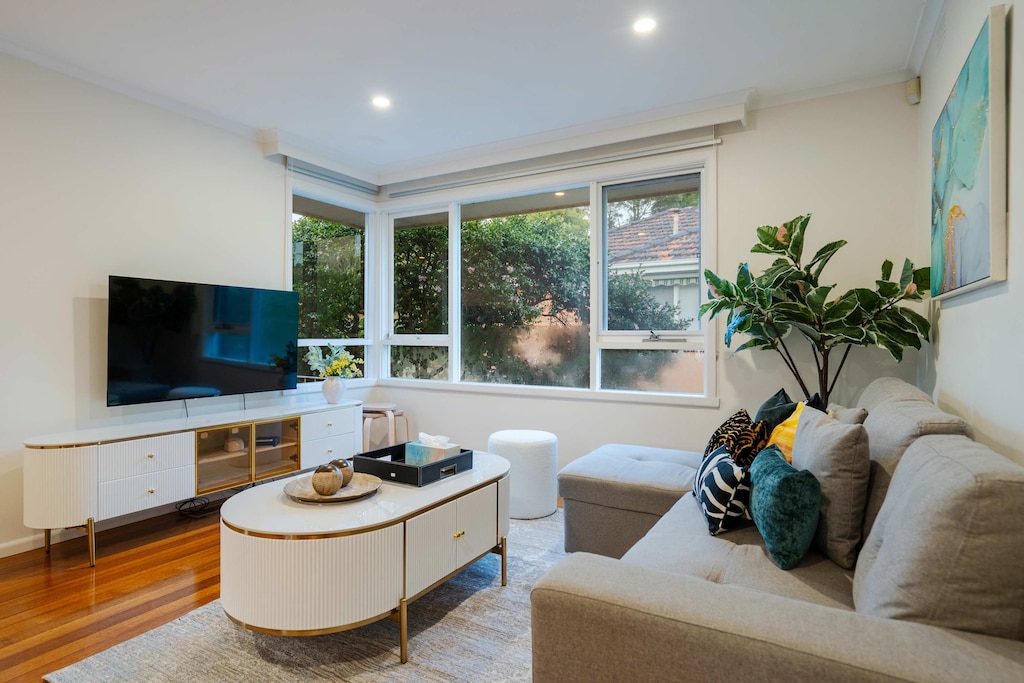 Spacious living area with plush sofa