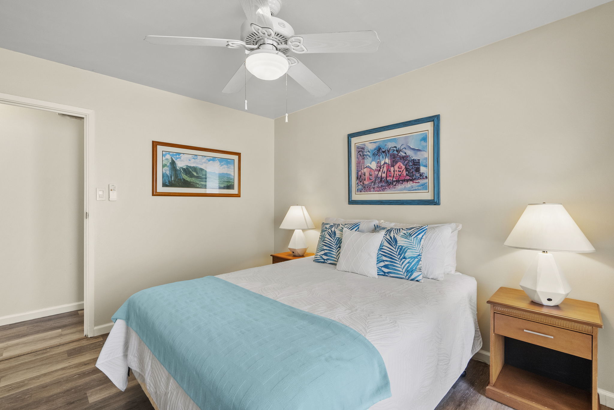 "Guest suite offering a serene retreat with premium linens and a plush queen bed.