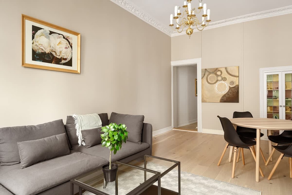 Kick back and relax in the sofa after a long day of exploring the city.