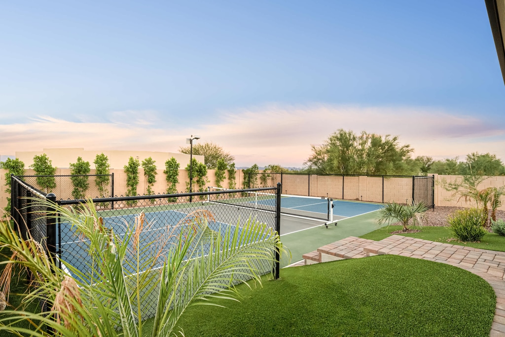 Embrace spirited play and sun-kissed moments on the court.