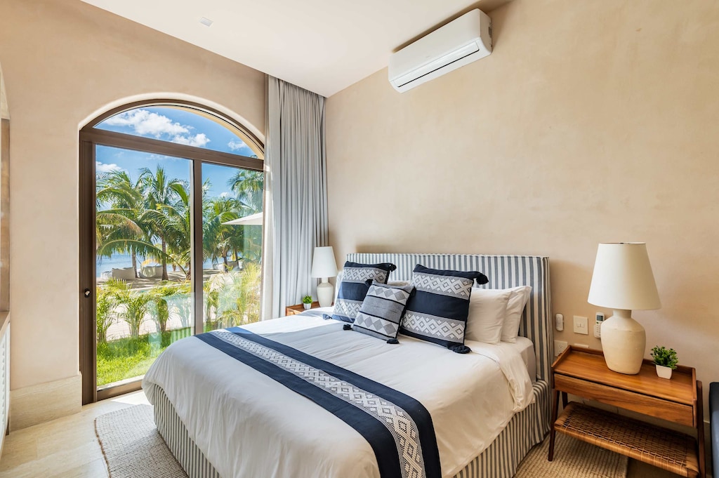 Mater Bedroom with garden and beach view