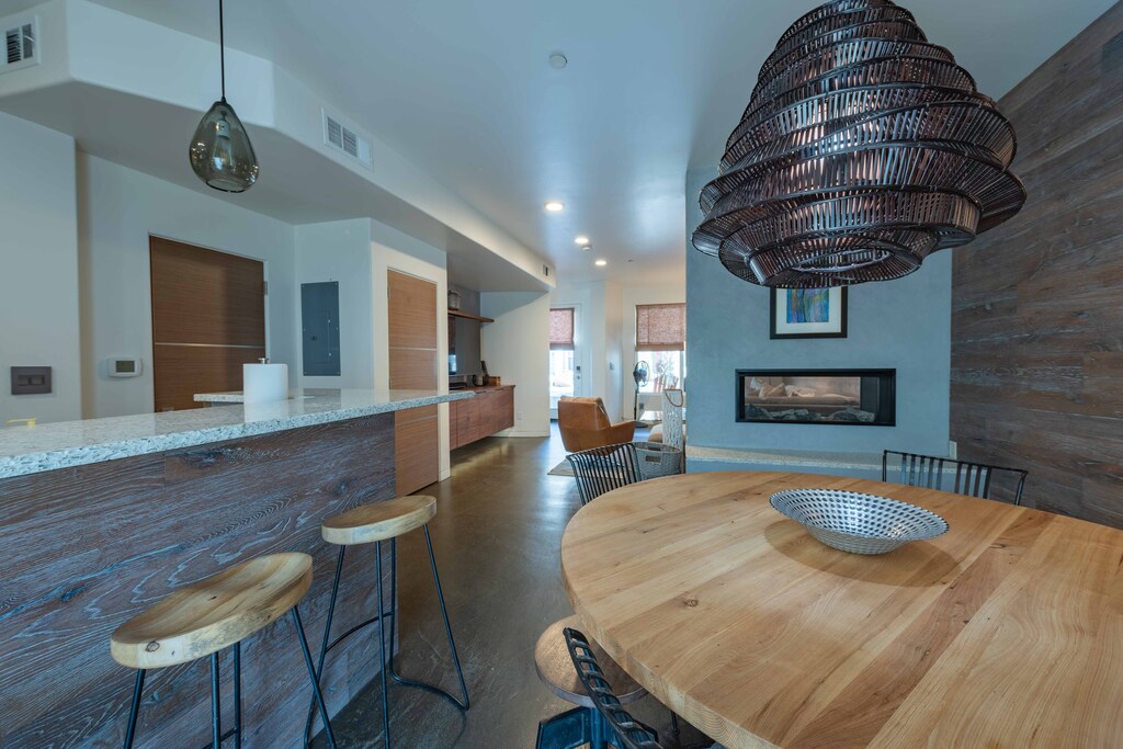 Dining room and barstool countertops located off of the kitchen