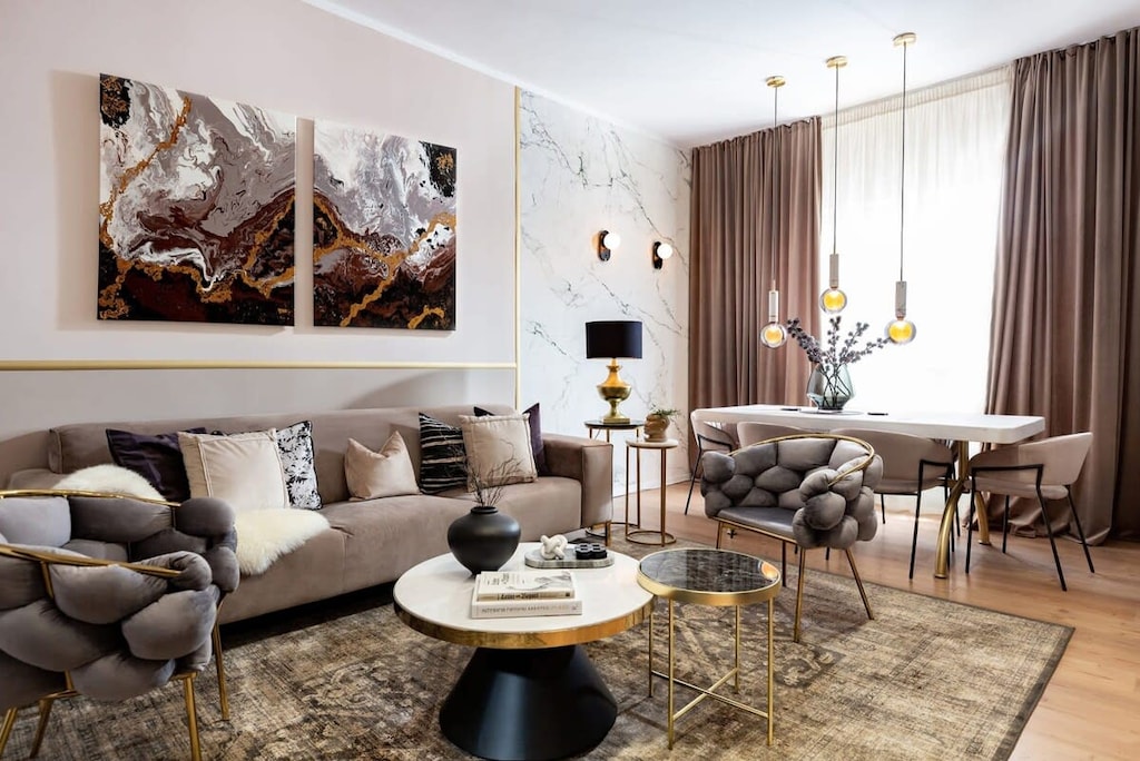 Enter our luxurious living room with chic grey accents, where comfort takes center stage in a cozy haven.