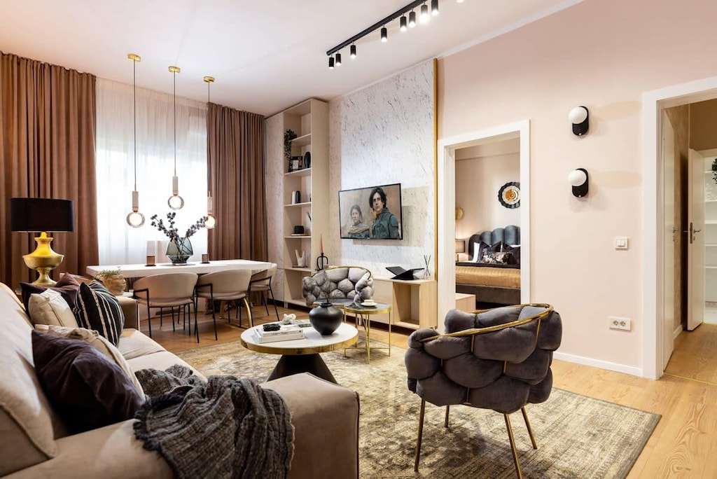 Discover our breathtaking living room, a cozy oasis with luxurious grey accents that elevate comfort to new heights.