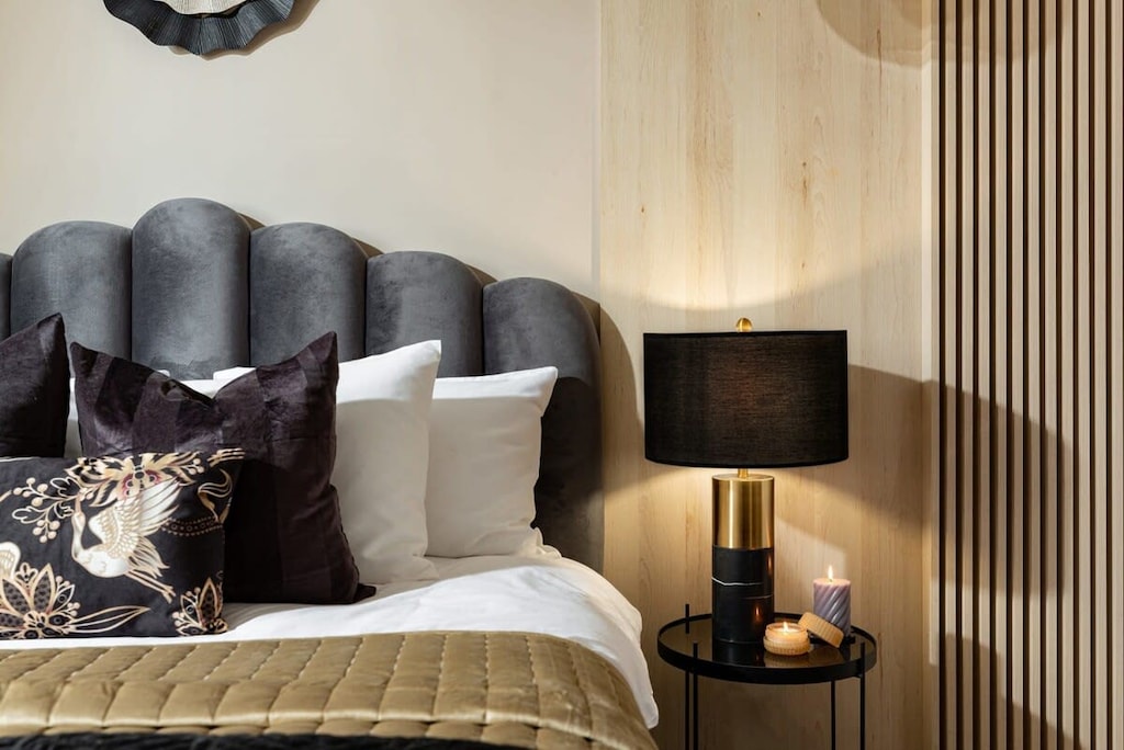 Surrender to tranquility in our bedroom, where soft hues and plush textures create a serene sanctuary for rest and relaxation.