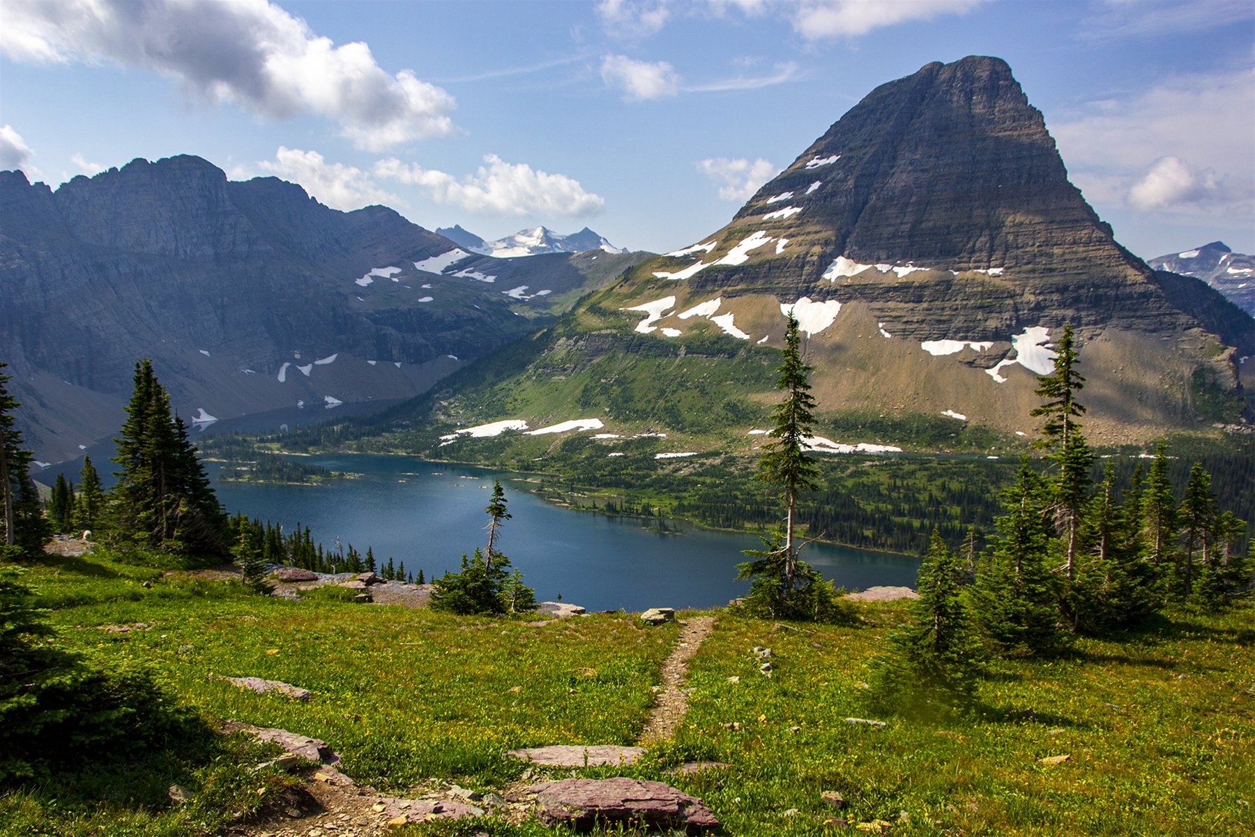 Visit beautiful Hidden Lake at Logan`s Pass in Glacier National Park. Visit beautiful Hidden Lake at Logan`s Pass in Glacier National Park.