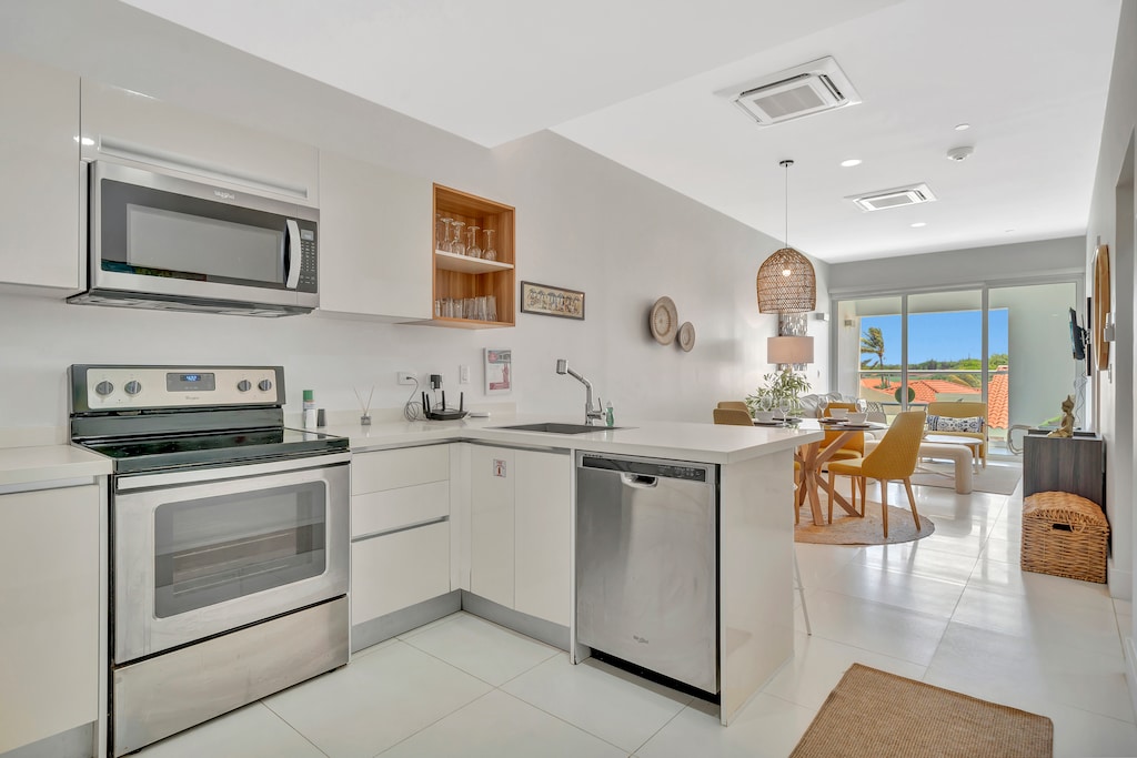 Whip up delicious meals in this sleek, fully equipped kitchen, just like home - Stainless steel appliances, modern finishes, and plenty of space to cook & create - Whether it’s morning coffee or a homemade feast, this kitchen has you covered