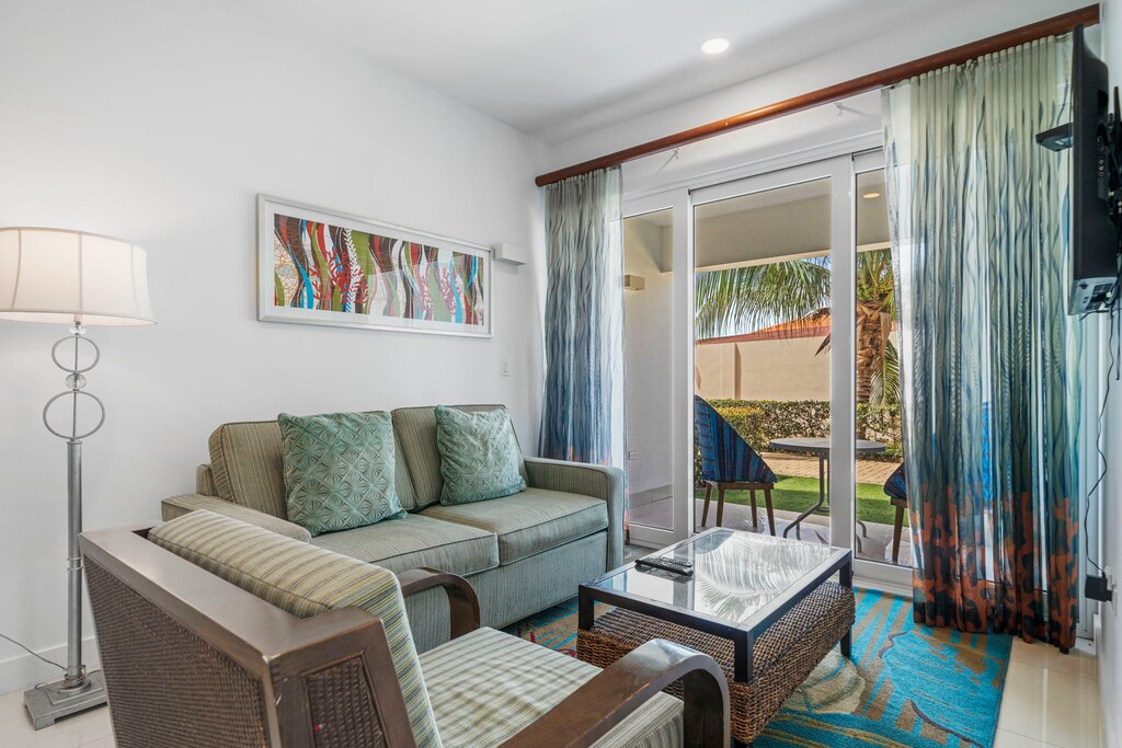 Cozy Living area has access to the private balcony