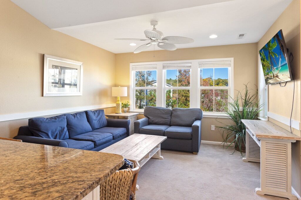 Spend your evenings relaxing in the open Living Area which flows seamlessly into the Dining and Kitchen spaces, creating a cozy environment for relaxation.