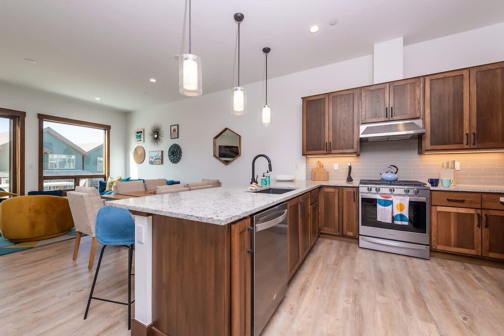 Our fully equipped kitchen has everything you need to whip up a feast. Enjoy spacious countertops, modern appliances, and a beautiful island for gathering.