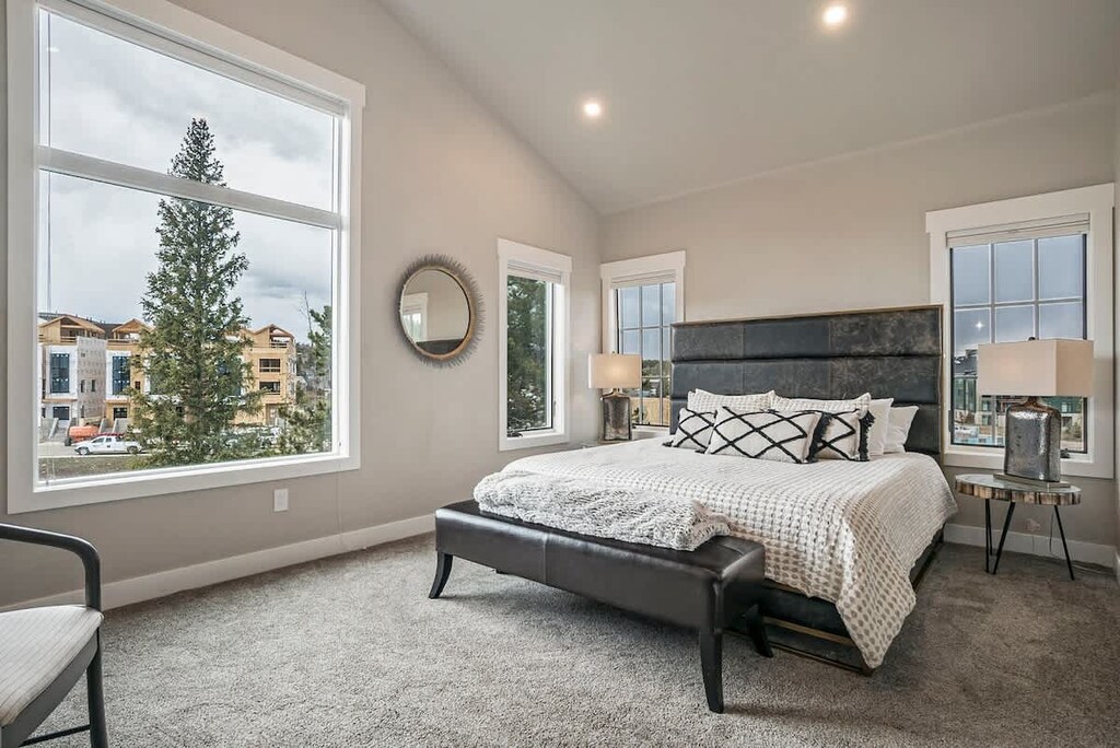 - Spacious suite features high ceilings, plush bedding, and windows that frame tree lined views
- Natural light pours in while neutral tones keep the vibe calm and cozy
- Retreat within your retreat, made for slow mornings and restful nights