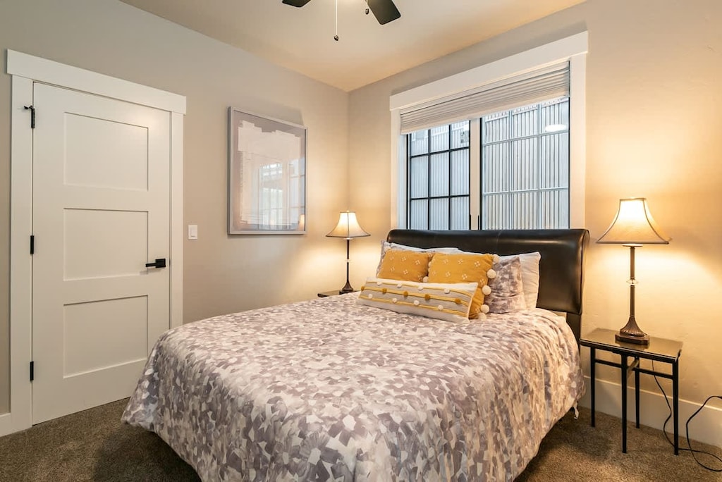 - Rest easy in this peaceful guest room featuring cozy bedding, golden accent pillows, and bedside lighting
- Warm, relaxing palette makes this the perfect escape for couples or solo travelers
- Sleep in worthy vibes with a grounding sense of calm