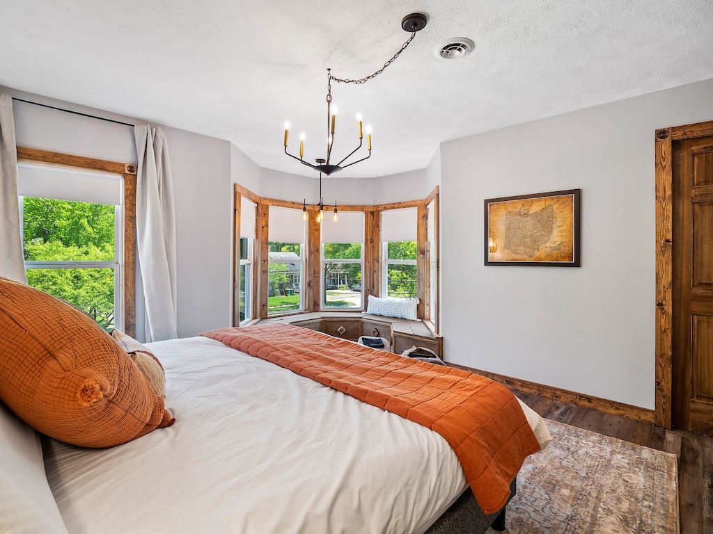 The Master has some beautiful chandeliers and a nice comfy king bed!