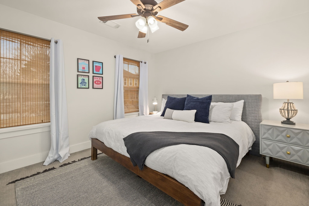 Our first bedroom is complete with a King-size bed, closet, Smart TV, and a nearby bathroom.