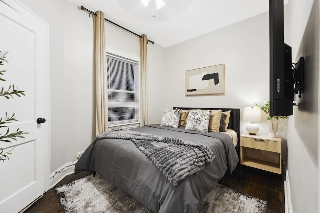Relaxing guest room with cozy bedding and closet space.