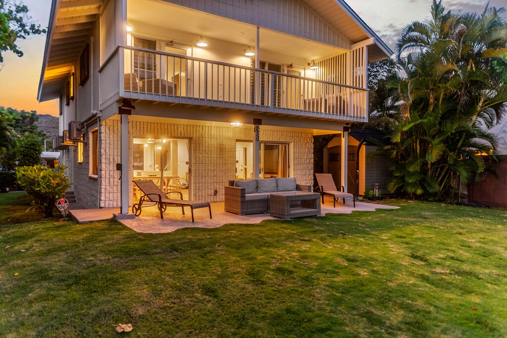 Covered lanai and lounge await, perfect for dinners under the stars.
